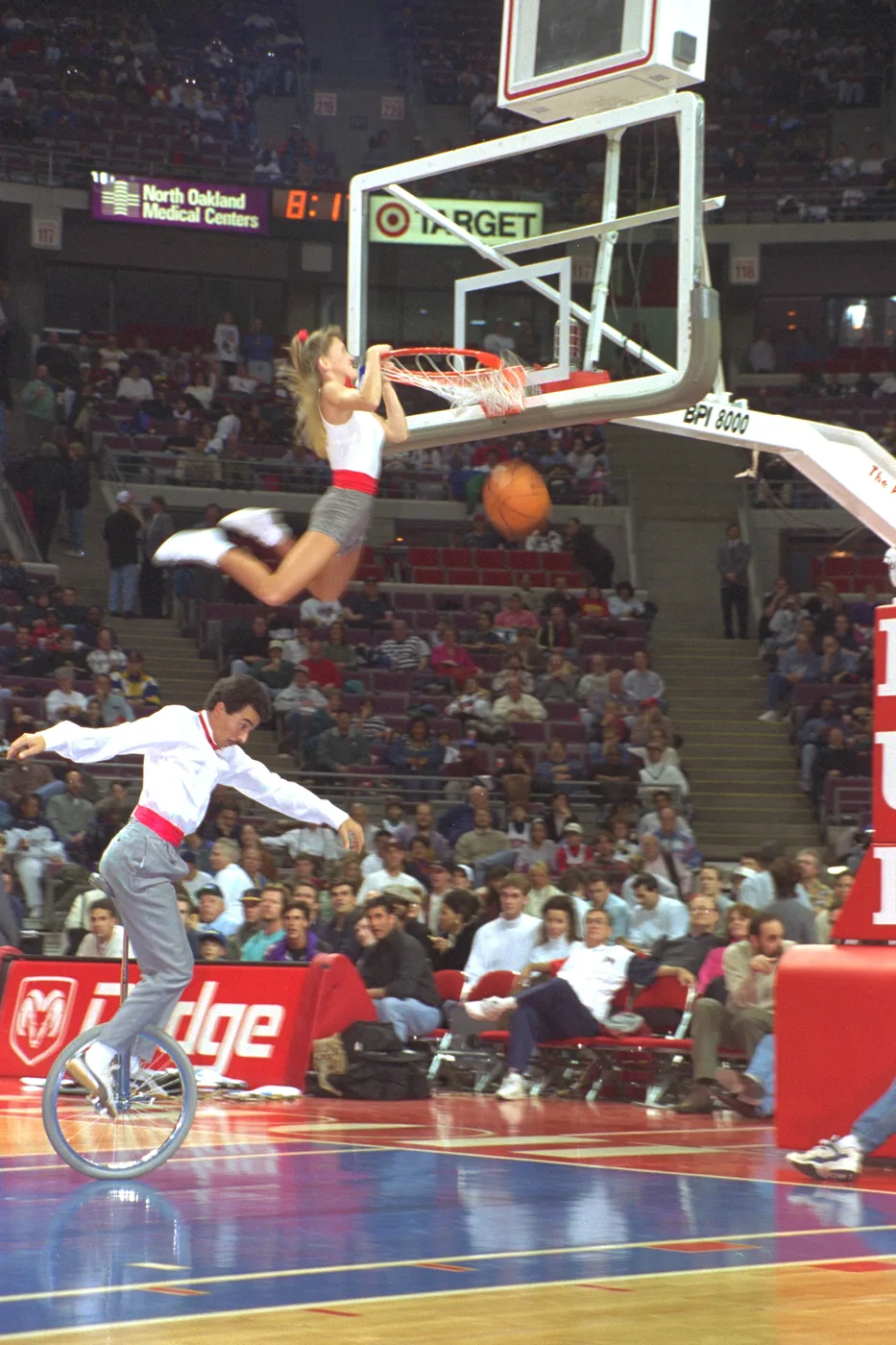 Slam dunk on a unicycle